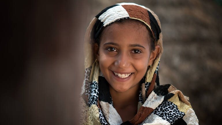 wardah_portrait Wardah lächelt in die Kamera