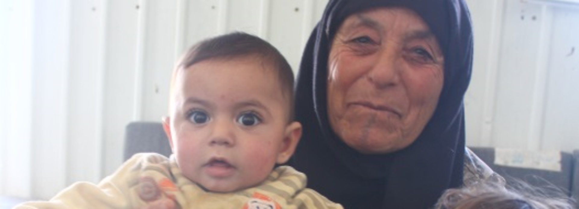 Amina mit Enkelkind Amina mit Enkelkind