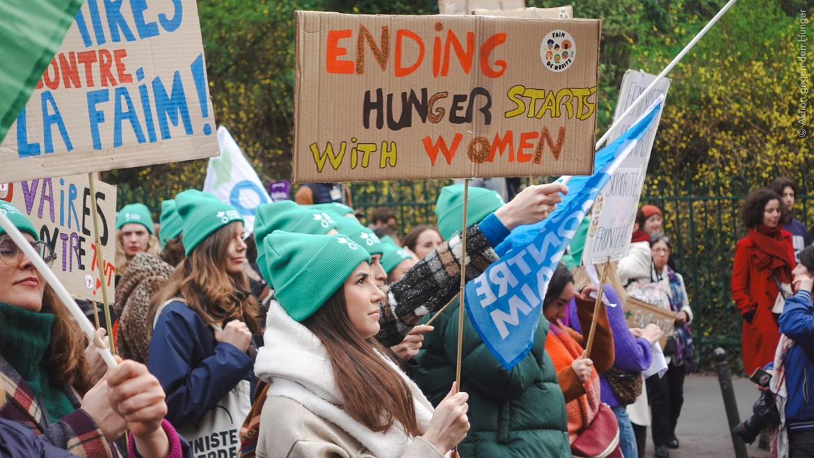 Aktion gegen den Hunger auf Protest für Frauenrechte