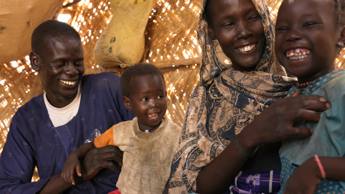 Glückliche Familie aus dem Sudan